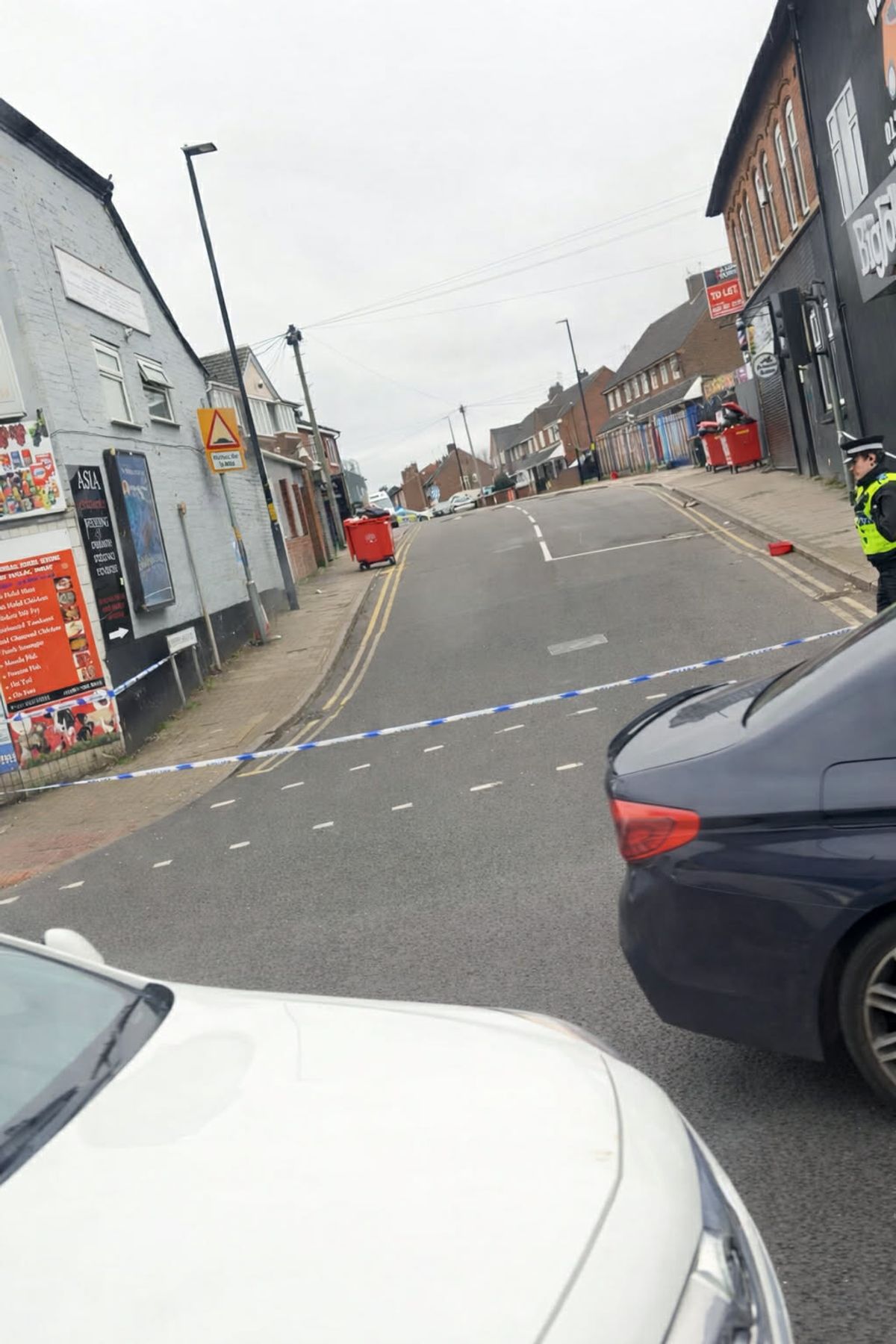 The police cordoned off Queens Head Road (pictured) and Rookery Road, either side of Soho Road, in Handsworth, after a man was found with injuries and taken to hospital