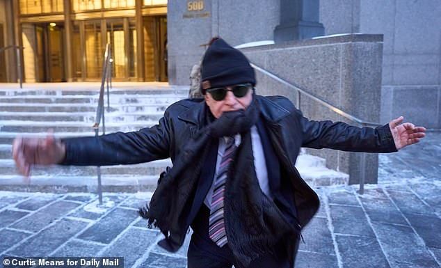 The brothers' father Shlomy Alexander attempted to rush at  a Daily Mail photographer as trial tensions spilled over