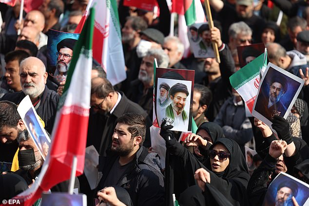 Iranians gather at Enqelab Square to show support for the newly appointed Supreme Leader Ayatollah Mojtaba Khamenei in Tehran