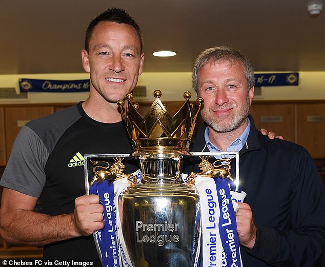 Chelsea were been hit with a £10.75million fine after breaking transfer rules during the Roman Abramovich era (pictured: Abramovich with John Terry in 2017)