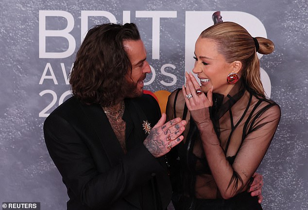 Olivia was pictured kissing her KissFM co-host, Pete Wicks, in a Soho hotel last weekend just seven weeks after announcing she was ¿divorcing¿ Mr Dack. Pictured together in March last year