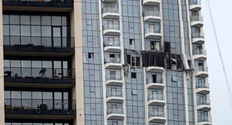 A view of the damaged part of the Dubai Creek Harbour Tower after it was hit by an Iranian drone attack in Dubai,