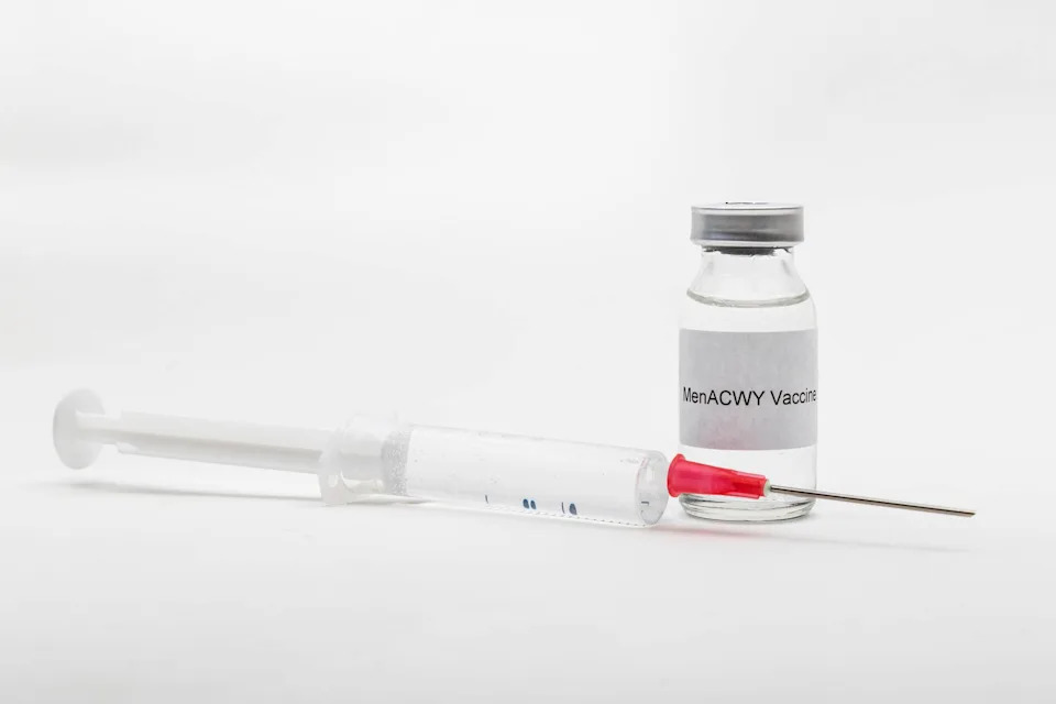 Medical concept showing a medical vial and a syringe.