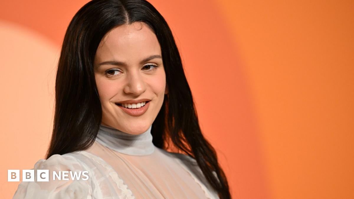Spanish singer Rosalia tosses her hair as she turns to look at the audience during a concert on her 2022 Motomami tour in Seville, Spain