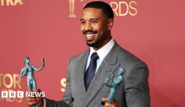 Michael B. Jordan poses with the Outstanding Performance By A Male Actor In A Leading Role award and the Outstanding Performance By A Cast In A Motion Picture award for "Sinners" during the Actor Awards, in Los Angeles, California, U.S., March 1, 2026.