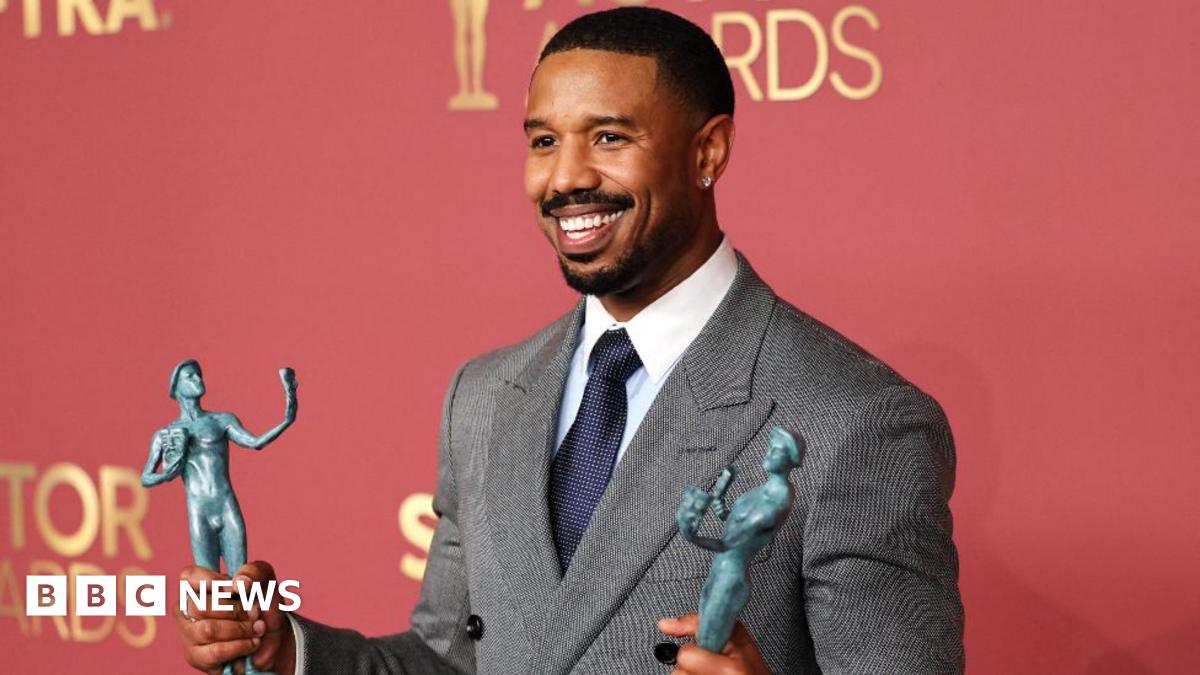 Michael B. Jordan poses with the Outstanding Performance By A Male Actor In A Leading Role award and the Outstanding Performance By A Cast In A Motion Picture award for "Sinners" during the Actor Awards, in Los Angeles, California, U.S., March 1, 2026.