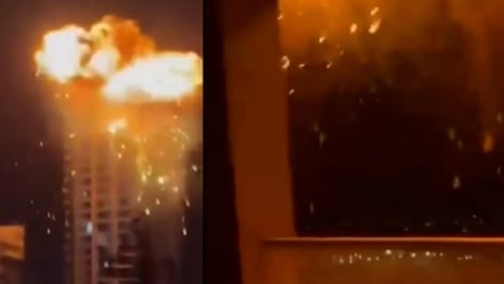 Footage shows moment Iranian strike hits high-rise in Bahrain – video