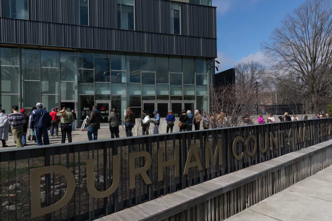 Voters wait in line to cast their ballots at the Durham County Main Library on the last day of early voting in the North Carolina primary election in Durham, North Carolina, US, on Saturday, Feb. 28, 2026. The North Carolina primary election will take place on March 3.