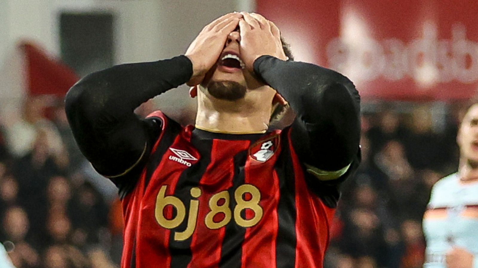 Marcus Tavernier reacts after seeing his shot hit the Brentford crossbar