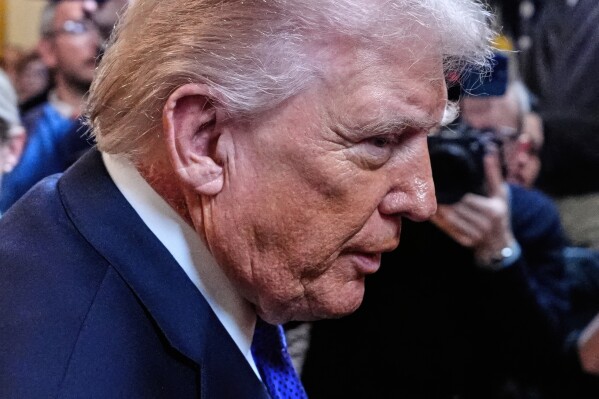 President Donald Trump departs after a Medal of Honor ceremony in the East Room of the White House, Monday, March 2, 2026, in Washington. (AP Photo/Alex Brandon)