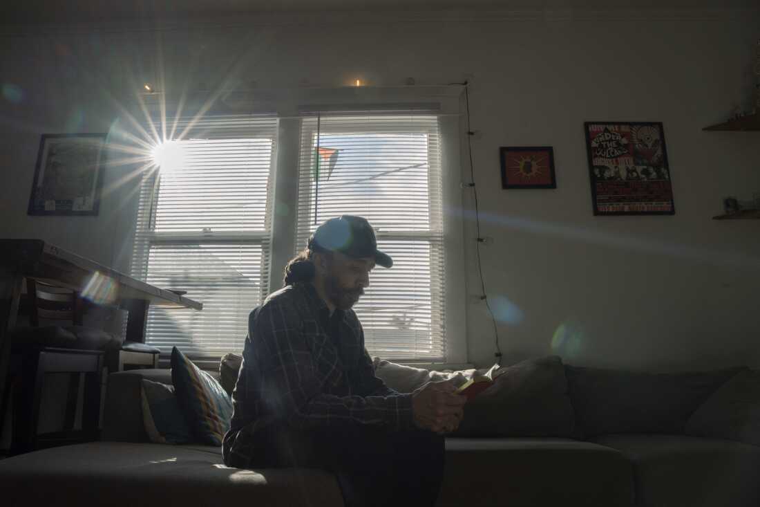 Sherman Austin, whose Instagram account information was subpoenaed by DHS for posting anti-ICE content, poses for a portrait in his home on March 1.