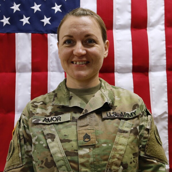 This image provided by the U.S. Army shows Sgt. 1st Class Nicole Amor, 39, of White Bear Lake, Minn., in this May 16, 2025, photo. (Sgt. Brent Newton/U.S. Army via AP)