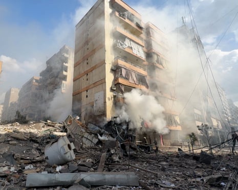 Smoke rises from a building damaged during strikes in Beirut on Thursday, in a screengrab from social media
