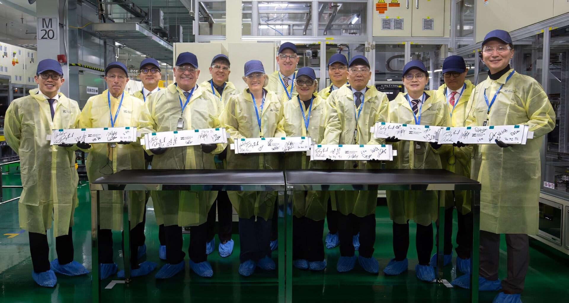 LG Energy Solution (LGES) CEO Kim Dong-myung, fourth from right, displays the company