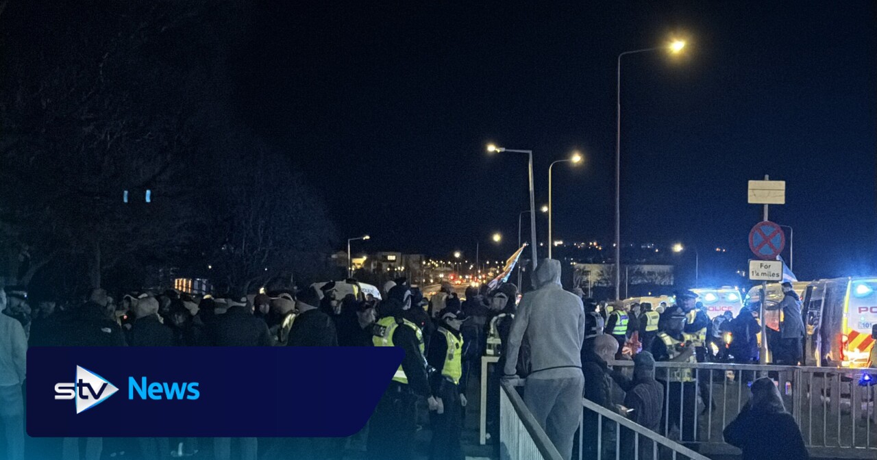 Police block road as protesters gather after Edinburgh double murder bid