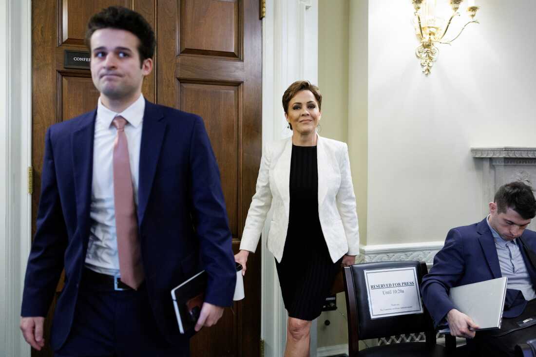 Kari Lake, senior adviser for the U.S. Agency for Global Media, departs following a House Committee on House Administration hearing on federal elections on Capitol Hill, Tuesday, Feb. 10, 2026, in Washington.
