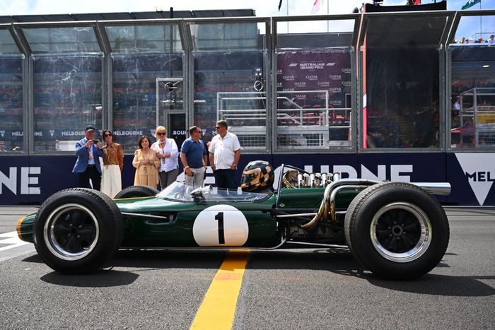 Sam Brabham drives a Brabham BT-19 on track