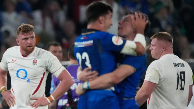England's players stand on the pitch at the end of the Six Nations rugby union match between Italy and England in Rome, Saturday, March 7, 2026. (AP Photo/Gregorio Borgia)