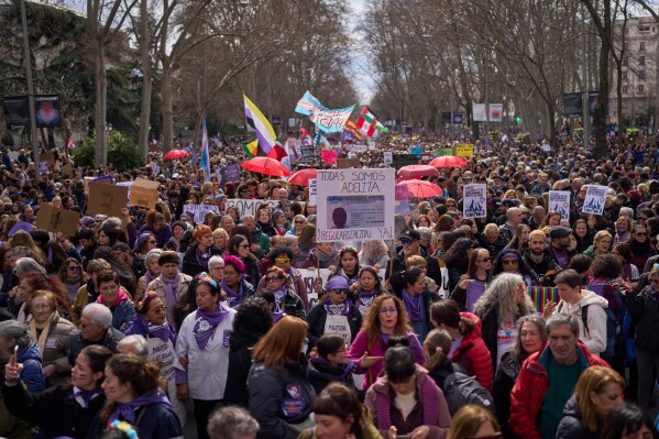 A woman shouts slogans during an International Women's Day protest in Madrid, Spain, Sunday, March 8, 2026. (AP Photo/Manu Fernandez)
