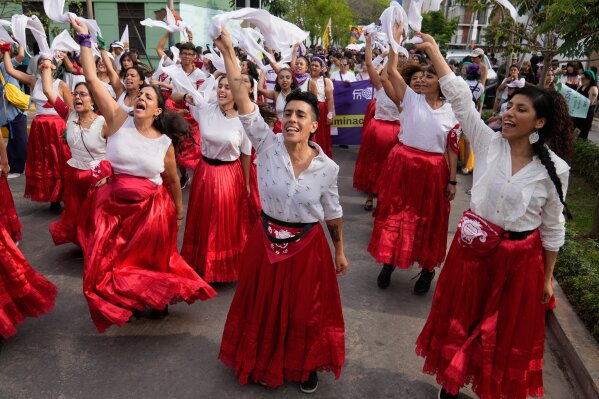 Demonstrators chant slogans as they march marking International Women's Day in Lima, Peru, Saturday, March 7, 2026. (AP Photo/Martin Mejia)