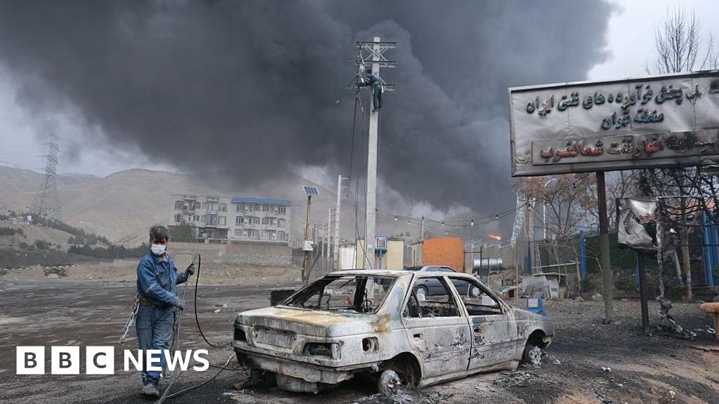 'Night turned into day': Iranians tell of strikes on oil depots - BBC