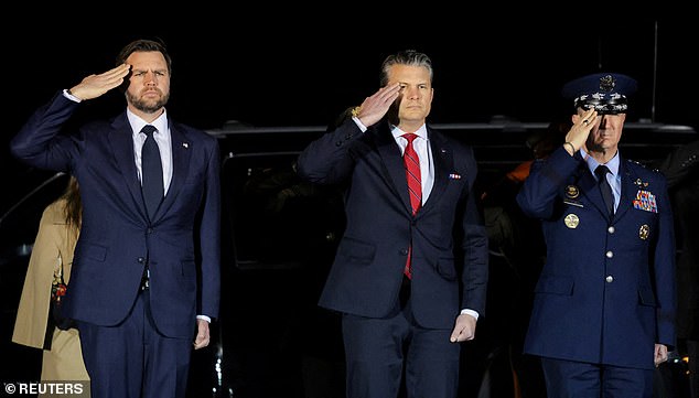 U.S. Vice President JD Vance, Secretary of Defense Pete Hegseth and Chairman of the Joint Chiefs of Staff Dan Caine salute during a dignified transfer of the remains of U.S. Army Sgt. Benjamin Pennington, who died on March 8 from injuries sustained during a March 1 attack at Prince Sultan Air Base in Saudi Arabia, at Dover Air Force Base in Dover, Delaware, U.S., March 9, 2026. REUTERS/Kylie Cooper