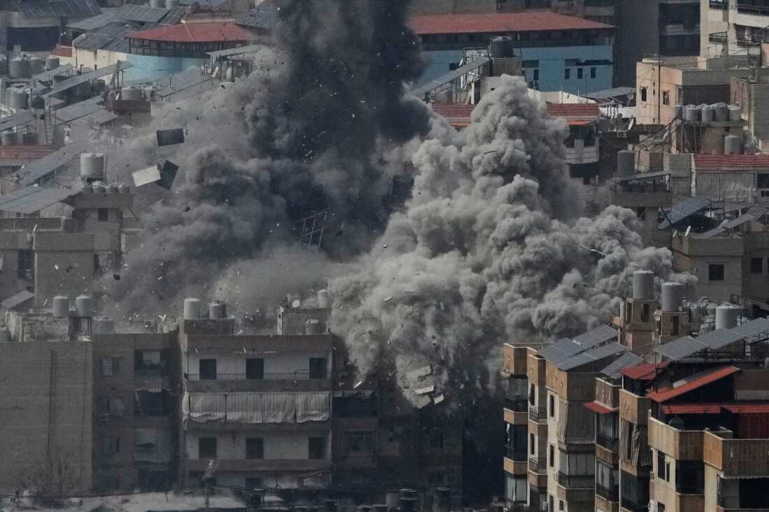 Smoke rises following an Israeli airstrike in Dahiyeh, Beirut's southern suburbs.