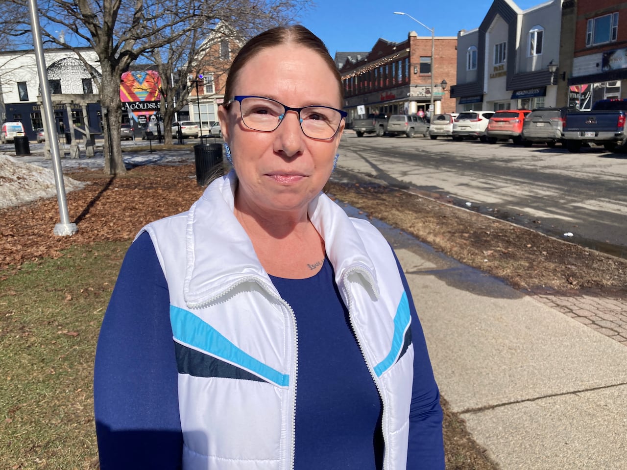 A woman poses for a photo