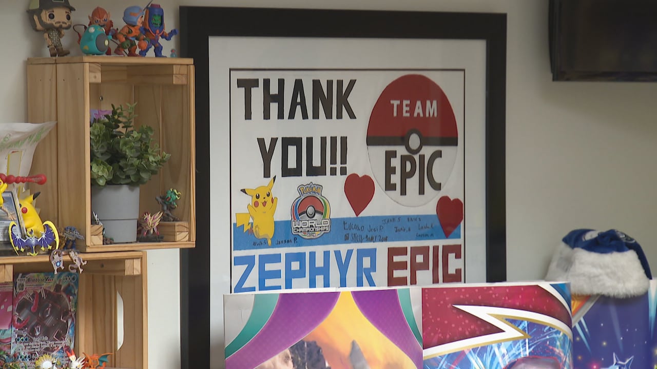A poster says 'Thank you!! Zephyr Epic' with cartoon animals and people's signatures visible.