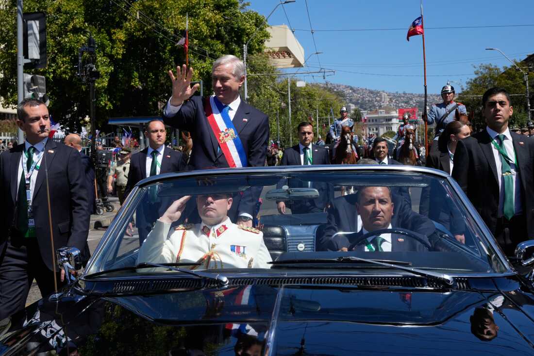 Chile's President José Antonio Kast waves to supporters as he leaves congress after his swearing-in ceremony in Valparaiso, Chile, March 11, 2026. 