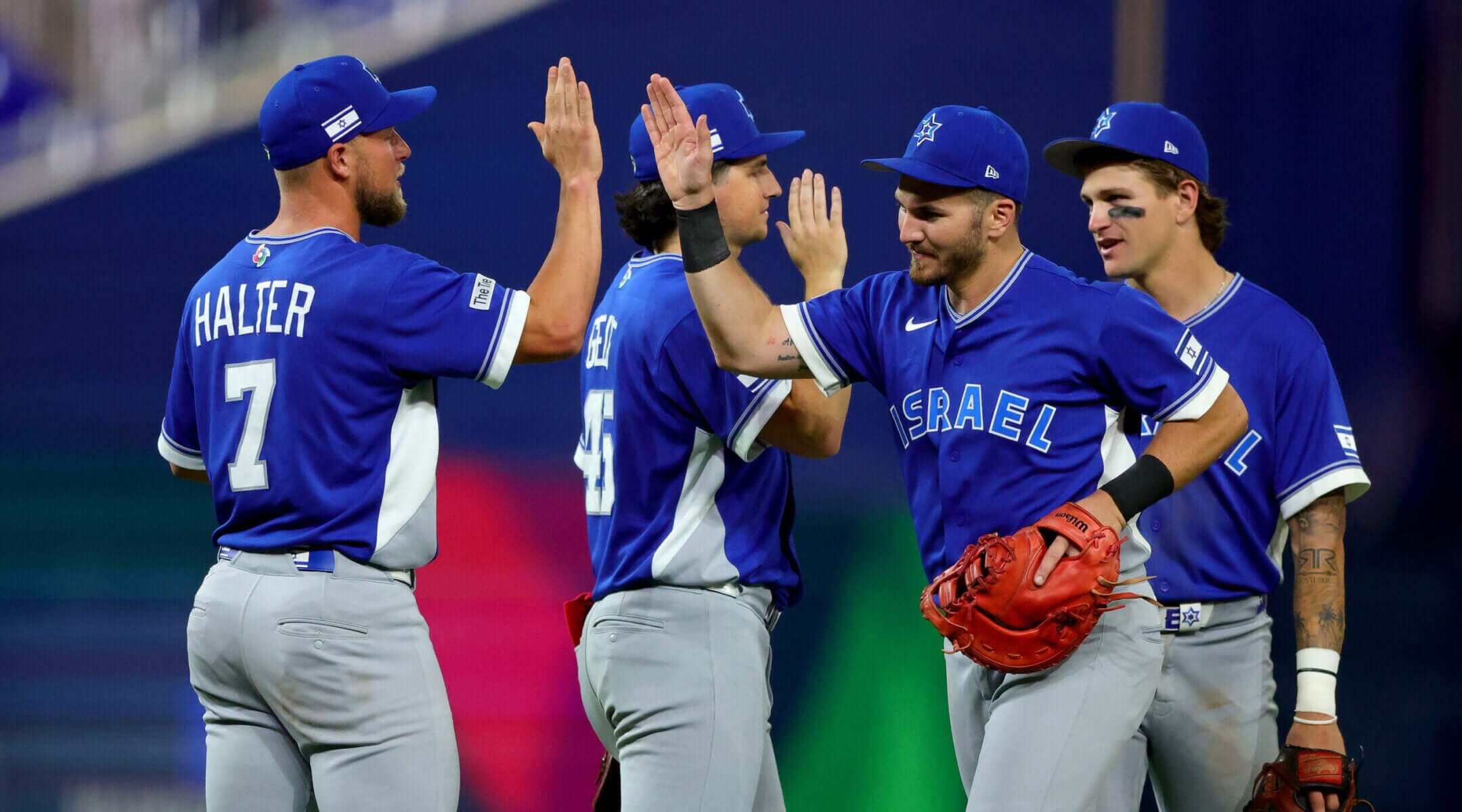 Members of Team Israel celebrate after beating the Netherlands at the 2026 World Baseball Classic at loanDepot park, March 10, 2026, in Miami. (Kelly Gavin/WBCI/MLB Photos via Getty Images)