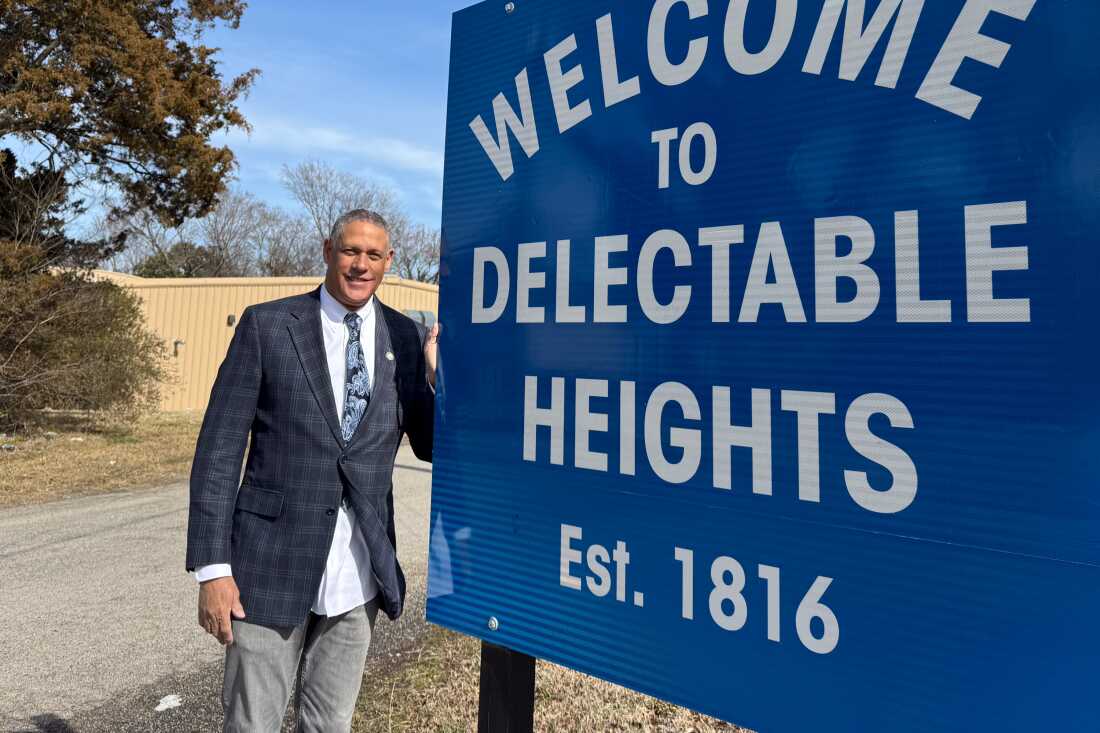 City Councilman Howard Myers stands at the entrance of Delectable Heights in Petersburg, Virginia.