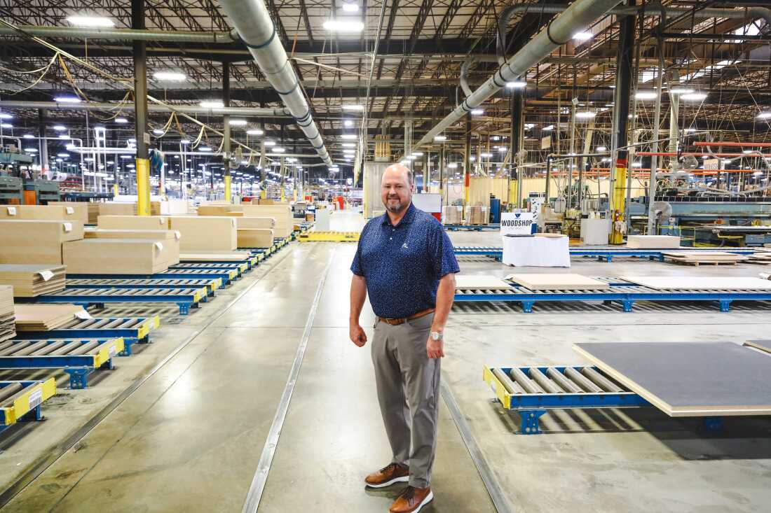 Virco’s vice president and general manager Steve Presley stands in the factory warehouse.