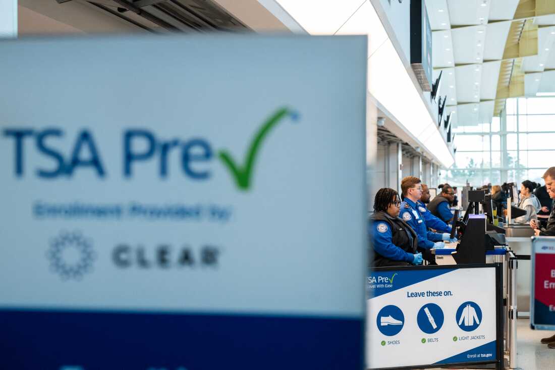 At Ronald Reagan Washington National Airport, TSA workers are still on the job Friday despite not receiving a full paycheck due to the partial government shutdown.