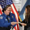 FILE - U.S. Homeland Security Secretary Kristi Noem, right, shakes hands with Transportation Security Administration Officer Monica Degro at a news conference at Harry Reid International Airport, Nov. 22, 2025, in Las Vegas.