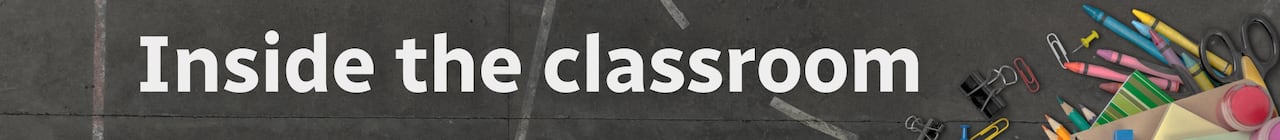 School-related graphics on blacktop.