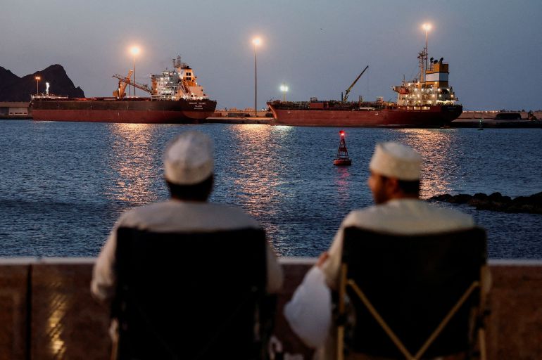 The Galaxy Globe bulk carrier and the Luojiashan tanker sit anchored as Iran vows to close the Strait of Hormuz, amid the U.S.-Israeli conflict with Iran, in Muscat, Oman, March 9, 2026. REUTERS/Benoit Tessier TPX IMAGES OF THE DAY
