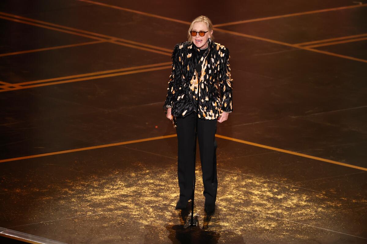 Amy Madigan accepts the supporting actor Oscar for "Weapons" during the 98th Academy Awards.