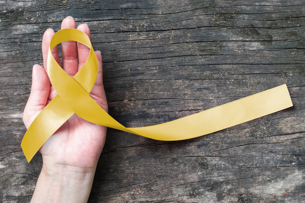 Yellow ribbon symbolic color for Endometriosis Awareness Month.