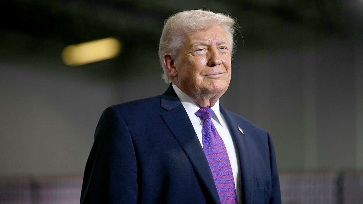 President Donald Trump arrives at a logistics facility in Hebron, Kentucky, before delivering remarks.