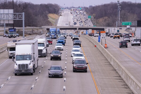 Traffic flows on I465 in Indianapolis, Tuesday, March 17, 2026. (AP Photo/Michael Conroy)