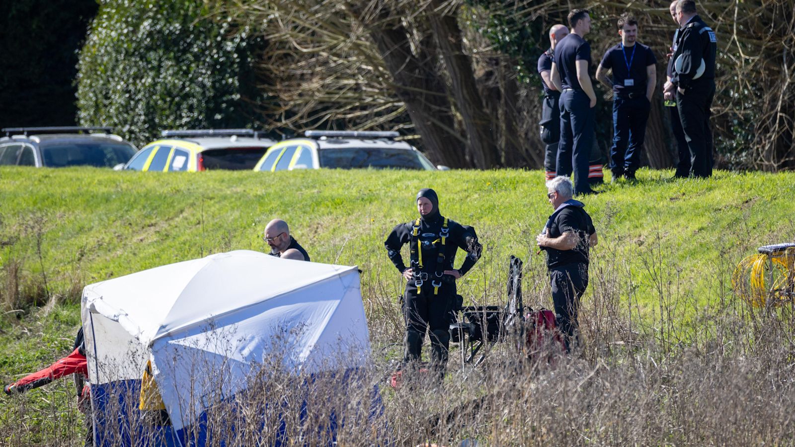 Girl's body found and teenage boy still missing after car carrying five people crashes into river