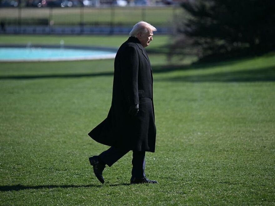 President Trump walks to the Oval Office at the White House in Washington, D.C., as he returns from Dover Air Force Base in Delaware after attending a dignified transfer solemn event on Wednesday.