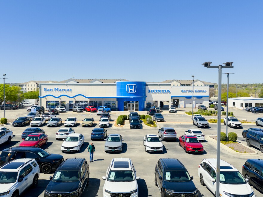 A Honda dealership is seen on March 12, 2026, in San Marcos, Texas. About 60% of the Honda vehicles sold in the U.S. last year were assembled in the United States, according to Honda, which means they could be eligible for a new tax provision allowing buyers to deduct the interest paid on their auto loans.