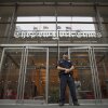 A police officer stands guard outside The New York Times building in New York, on June 28, 2018.