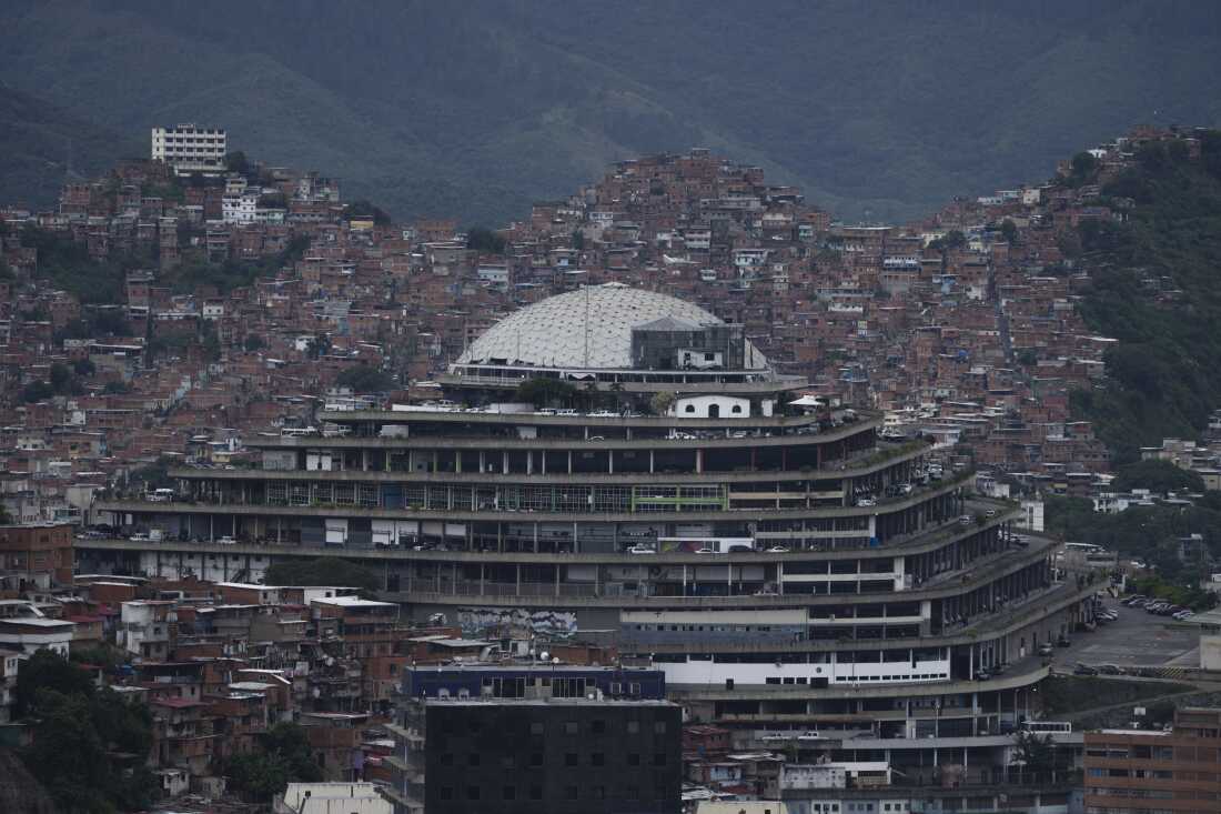 Venezuela's National Intelligence Service (SEBIN) headquarters, known as El Helicoide, stands in front of La Cota 905 neighborhood in Caracas, Venezuela, Sept. 12, 2022. 