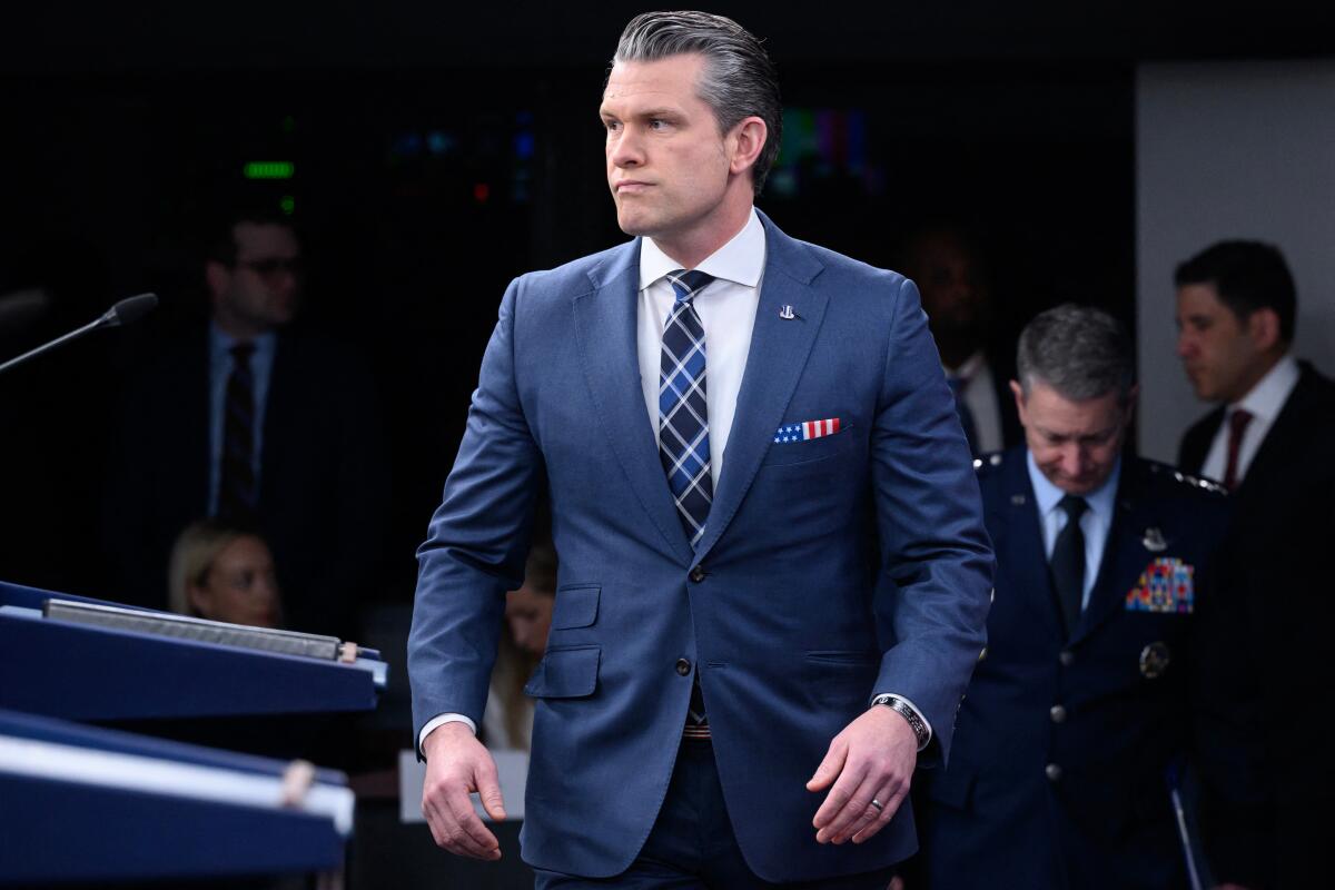 Secretary of Defense Pete Hegseth and Chairman of the Joint Chiefs of Staff Gen. Dan Caine arrive for a news conference