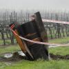 The tail section of a ballistic missile fired from Iran, sticks out of the ground at a vineyard in the Israeli controlled Golan Heights on March 20, 2026 in Golan Heights, Israel.