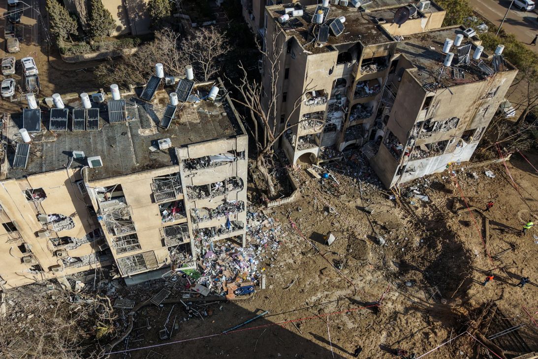 A drone view shows a crater in a residential neighborhood, following a night of Iranian missile strikes which injured dozens of Israelis in Arad, southern Israel, on March 22.