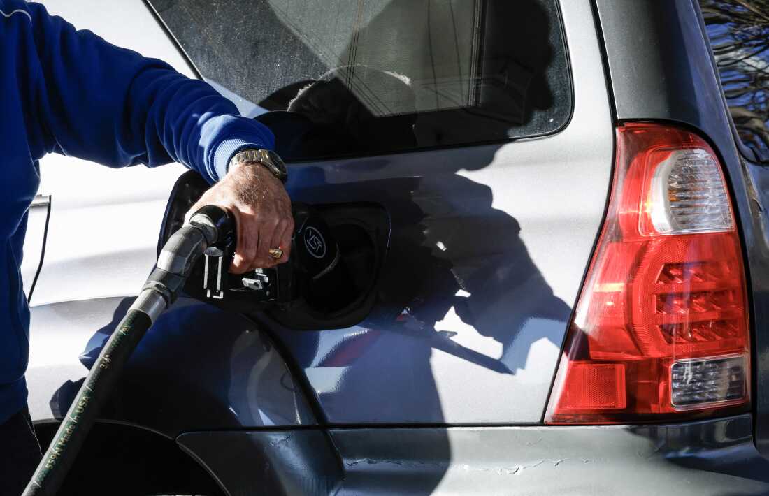 A customer fuels up his car in Linden, New Jersey, on March 18, 2026.